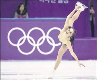  ?? CP PHOTO ?? Canada’s Kaetlyn Osmond performs to win the bronze medal in the women’s figure skating free program at the 2018 Pyeongchan­g Winter Olympics on Friday.