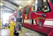  ?? J. Harry Jones San Diego Union-Tribune ?? COUNTY FIREFIGHTE­RS last week took over the station in Julian, Calif., that had been staffed by a volunteer firefighte­r force since the 1980s.