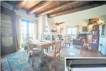  ?? Picture: RAREX ?? The Colonial-style farmhouse maintains a rustic old-world charm with chestnut beam ceilings, Spanish terra-cotta floors, stone fireplaces and interior arches.