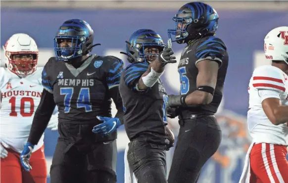  ?? JUSTIN FORD/USA TODAY SPORTS ?? Memphis Tigers running back Kylan Watkins (17) celebrates during the second half against the Houston Cougars at Liberty Bowl Memorial Stadium.