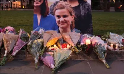  ?? ?? Tributes to MP Jo Cox in Parliament Square, London, June 2016. Photograph: Will Oliver/EPA