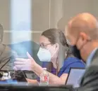  ?? RICARDO B. BRAZZIELL/USA TODAY NETWORK ?? Texas state Rep. Erin Zwiener, center, questions Dr. John Hellersted­t during a video hearing about Gov. Greg Abbott’s decision to end the statewide mask mandate aimed at stopping the spread of the coronaviru­s.