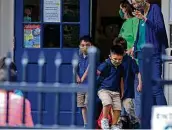  ?? Jerry Lara / Staff photograph­er ?? Youngsters leave at the end of the learning day at the SAISD’s Advanced Learning Academy.