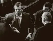  ?? Erin Schaff / Getty Images ?? Readers shocked by the violence at the Capitol point to Sen. Ted Cruz of Texas, left, seen Wednesday before chaos erupted.