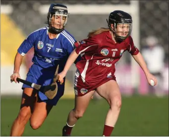  ??  ?? Leading scorer Chloe Foxe racing away from Thomastown defender Catherine Walsh.