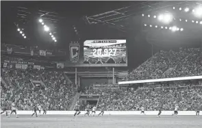  ?? ADAM CAIRNS/COLUMBUS DISPATCH ?? The attendance of 20,927 is shown on the video board during the second half of the MLS match between the Columbus Crew and CF Montreal at Lower.com Field on April 27. It was a record setting crowd for the venue.