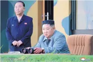  ?? KOREAN CENTRAL NEWS AGENCY/KOREA NEWS SERVICE ?? North Korean leader Kim Jong Un watches a missile test in North Korea last month. Another round of two missiles was launched today.