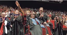  ?? AP ?? Autherine Lucy Foster acknowledg­es the crowd Friday in Tuscaloosa, Ala.