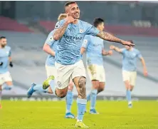  ??  ?? Gabriel Jesus celebrates after scoring City’s second.