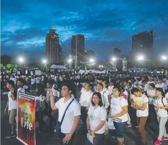  ?? Picture: AP ?? Roman Catholics march in Manila's Rizal Park to oppose extrajudic­ial killings.