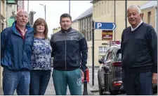  ?? Photos by Domnick Walsh ?? Noel, Ellen and Cillian Courtney of Courtney’s Bar with County Councillor Robert Beasley. The family hope to be able to re-open the bar while maintainin­g social distancing.