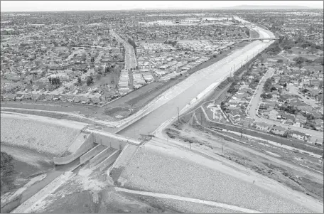  ?? Brian van der Brug Los Angeles Times ?? THE 3-MILE-LONG Whittier Narrows Dam stretches from Montebello to Pico Rivera and crosses the San Gabriel and Rio Hondo rivers.