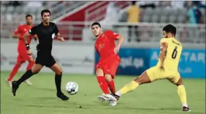  ??  ?? Action from the Al Duhail-Qatar SC QNB Stars League match played at the Al Duhail Stadium on Saturday.