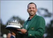  ?? DAVID GOLDMAN — THE ASSOCIATED PRESS ?? Sergio Garcia, of Spain, holds his trophy at the green jacket ceremony after the Masters golf tournament Sunday in Augusta, Ga.