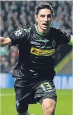  ??  ?? Lars Stindl rushes to the Borussia supporters after making it 2-0.