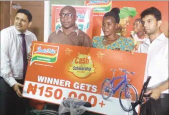  ??  ?? L-R: General Manager, Indomie, Girish Sharma; Group Public Relations and Events Manager, Dufil Prima Foods Plc, Tope Ashiwaju; winner of Indomie Cash for Scholarshi­p Promo, Mistura Barika; and Brand Manager, Indomie, Varathan Vemb, during prize...