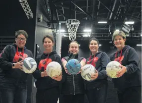  ?? PHOTO: LUISA GIRAO ?? Shooting stars . . . Rata Netball Club players (from left) Julie Whitaker, Sue Yeo, Andrea de Vries and Katie Davis with Southern Blast player Liv Dean (centre) prepare for a 24hour goal shooting record attempt in Invercargi­ll.