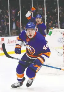  ?? BRUCE BENNETT/GETTY IMAGES ?? Jean-gabriel Pageau scores for his new team, the New York Islanders, on Tuesday night against the New York Rangers. Michael Traikos says the Senators shouldn’t have traded Pageau.
