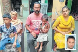  ?? HT PHOTO ?? Family members of Kamal Manjinder Singh (inset) at their Gurdaspur house on Sunday.