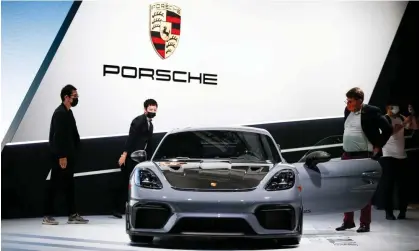  ?? ?? Part of the proceeds from the Porsche IPO would help fund the shift towards electric vehicles and battery technology. Photograph: Ringo Chiu/Reuters