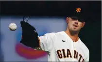  ?? RAY CHAVEZ — BAY AREA NEWS GROUP ?? San Francisco Giants starting pitcher Drew Smyly gets a new ball after allowing a run by the Colorado Rockies in the sixth inning at Oracle Park in San Francisco on Sept. 22.