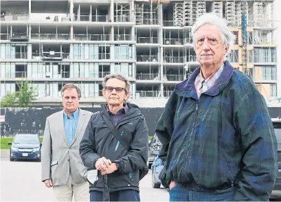  ?? ANDREW FRANCIS WALLACE TORONTO STAR ?? Don Mills resident representa­tives Stephen Ksiazek, left, Brian Story and Terry West at the proposed site of a community centre. Residents agreed in 2010 to drop opposition to a Cadillac Fairview condo project in exchange for the centre. They are still waiting.