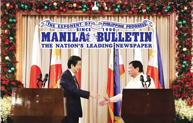  ?? (Richard Viñas) ?? WARM WELCOME – President Duterte and Japan’s Prime Minister Shinzo Abe shake hands after the welcoming ceremonies for the Japanese leader in Malacañang Thursday. The two are expected to discuss mutually important concerns, including the sensitive issue...