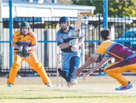  ?? Picture:Brian Cassidy ?? AT THE CREASE: Darling Downs batsman Matthew Hallas drives the ball down the ground.