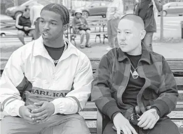  ?? NICOLE RIVELLI/FOCUS FEATURES ?? Rapper Bashar“Pop Smoke”Jackson, left, and director Eddie Huang on the set of“Boogie.”