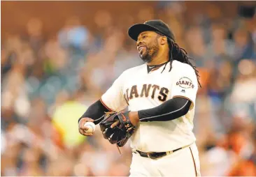  ?? JOSIE LEPE/STAFF ?? The Giants’ Johnny Cueto reacts after walking the Diamondbac­ks’ A.J. Pollock in the first inning Tuesday.