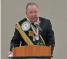  ?? EVAN LASSETER/SAVANNAH MORNING NEWS ?? St. Patrick’s Day Parade Grand Marshal John Forbes gives his marshal’s address at the public investitur­e on Sunday.