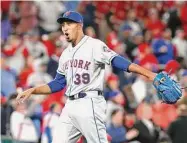  ?? Jeff Roberson/Associated Press ?? New York Mets relief pitcher Edwin Diaz celebrates after getting St. Louis Cardinals’ Yadier Molina to fly out for the final out of a 2019 game, in St. Louis.
