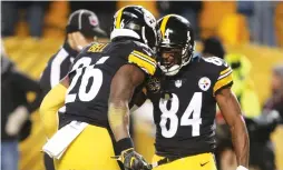  ?? (Reuters) ?? RECENTLY THOUGHT OF as the two lynchpins of the Pittsburgh Steelers offense, Le’Veon Bell (left) and Antonio Brown (right) could both find themselves playing in a different uniform next season.