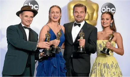  ?? AP ?? Oscar winners in 2016, from left, Mark Rylance, winner of the award for best actor in a supporting role for Bridge of Spies, Brie Larson, winner of the award for best actress in a leading role for Room, Leonardo DiCaprio, winner of the award for best actor in a leading role for The Revenant, and Alicia Vikander, winner of the award for best actress in a supporting role for The Danish Girl.