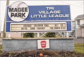  ?? Lori Van Buren / Times Union ?? A sign that reads “no place for racism and hate in Little League” is seen in front of the Magee Park Tri-village Little League sign on Thursday in Bethlehem. A player’s dad proposed sponsoring a BLM banner.