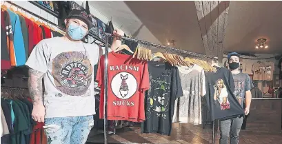  ?? STEVE RUSSELL PHOTOS TORONTO STAR ?? Brothers Gavin and Ross Clark started selling vintage clothing at the Pickering Market before opening their store four years ago.