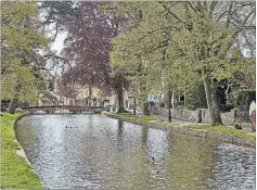  ??  ?? Bourton-onthe-Water, on the banks of the River Windrush.