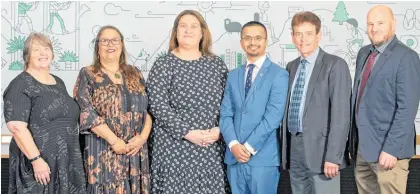  ?? ?? Te Puke Community Board chairwoman Kassie Ellis, third left, board members Karen Summerhays, Dale Snell, deputy chairman Anish Paudel and councillor­s Grant Dally and Andy Wichers.
