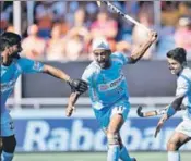  ?? HOCKEY INDIA ?? Mandeep Singh (centre) celebrates after scoring against the Netherland­s in the Champions Trophy on Saturday. India drew 11 to enter the final.