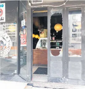  ?? Photo / Supplied ?? Krwoon Keum believes someone damaged his sushi shop window because he complained on TV about the city rail link disruption.