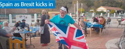  ?? Photo: Nampa/AFP ?? Bowing out… A man holds the Union Jack at Anti-Brexit British bar during throws mock EU goodbye party in Jimera de Libar.