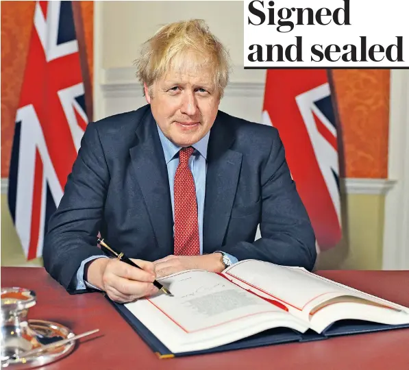  ??  ?? Boris Johnson signing the official European Union (Withdrawal Agreement) Act 2020, inside 10 Downing Street. He described it as a fantastic moment that heralded a new chapter in the nation’s history