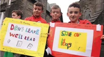  ??  ?? ( L- R), Fionn and Óran McNulty with Joel Campbell at the protest ouside Sligo Library last Saturday.