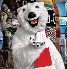  ?? CONTRIBUTE­D BY WORLD OF COCA-COLA ?? Museum visitors can sample more than 100 drinks and snap photos with the iconic Coca-Cola Polar Bear.
