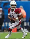  ?? ADAM HUNGER — THE ASSOCIATED PRESS ?? Quarterbac­k Kyler Murray was the top pick in the draft by the Arizona Cardinals, who convinced him to choose the NFL over a baseball career with the A’s.