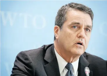  ?? FABRICE COFFRINI / AFP / GETTY IMAGES FILES ?? “This is a crucial moment in the way that the internatio­nal community thinks about trade and the trading system,” WTO head Roberto Azevedo said Tuesday.