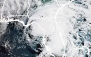  ?? NASA/NOAA/AFP via Getty Images ?? This National Oceanic and Atmospheri­c Administra­tion satellite image shows Tropical Storm Elsa over Florida earlier Wednesday.