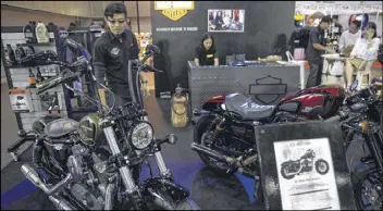  ?? LUKE DUGGLEBY / THE NEW YORK TIMES ?? HarleyDavi­dsons were found at the Bangkok Hot Rod Custom Show earlier this month.