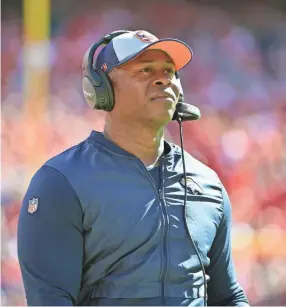 ??  ?? Broncos head coach Vance Joseph watches the replay screen during Denver’s game against the Chiefs on Sunday.