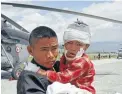  ?? Photo: REUTERS ?? Amancarrie­s an injured child, who was wounded in Saturday’s earthquake, after Indian Army soldiers evacuated them from Trishuli Bazar to the airport in Kathmandu, Nepal.